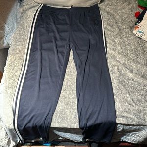 Adidas size 2 XL color navy white, very loose not tapered at the bottom